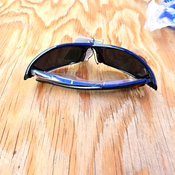 Khan Innovative Eyewear Black and Gold Sunglasses - Picture 8 of 16